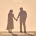 Shadows of a couple holding hands in warm sunlight, on rebuilding trust after an affair