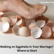 Bare foot stepping onto broken eggshells, showing what walking on eggshells in marriage feels like